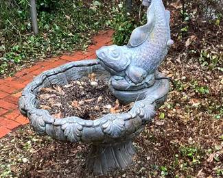 Cement fish fountain.Price. $80.00