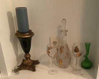 Vintage wine decanter with wine glasses.