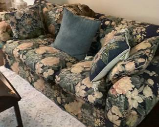 Beautiful Henredon couch in navy back ground cover with flowers. Needs a tear fixed in the arm, but in great condition beside that. Price: $75.00