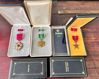 military medals, and two empty medal boxes