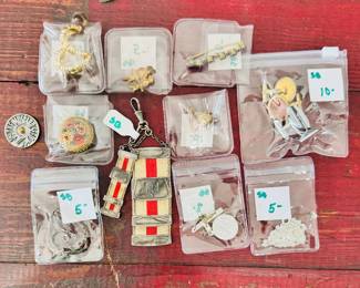 Costume jewelry, military items, some antique
