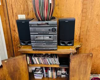 stereo system, German vase, console cabinet, CDs