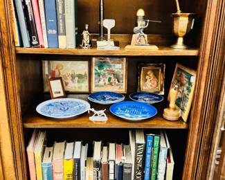 books, plates, figurines, mortar and pestle, art
