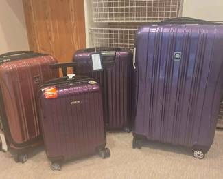 HA138Travel Suitcases. Delsey And Rimowa