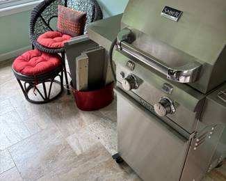 Saber grill and wicker chair