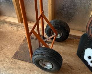 M50 - $30. Metal Dolly. Heavy Duty but no weight ratings / name etc.