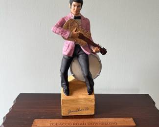 M7 - $20. Elvis Decanter Music Box.