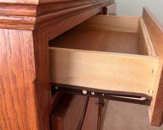 M12 - $75. Buffet / Server in Cedar Finish. C.J. Woodmaster. Very good condition. Measures 49.25" x 17.5" x 34" tall.