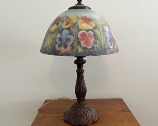 M35 - $40. Table Lamp with Painted Glass Shade. Tiffany Style with Pansy Design. Measures 18.5" tall.