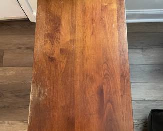 M28 - $20. Drop leaf side table. Measures 30" wide with leaves out. 15" wide when leaves are down. 25" deep x 25.25" tall. Sturdy! Great project piece. Does have wear on the top and water ring on the shelf.