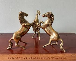M16 - $50. Brass 3 Horse Pedestal Stand (holds a crystal sphere). Measures 10" wide x 6" tall.