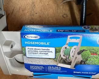 M51 - $20. Suncast Hosemobile. Brand New! Holds 175' of hose.