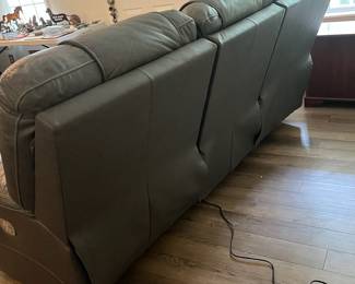 M2 - $450. Ashley Furniture Power Reclining Sofa. Measures 87.5" long x 36" deep x 42" tall. Gently used - cushion on the right shows the most wear.