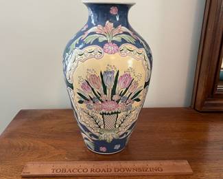 M32 - $10. Decorative Vase. Measures 7" across x 12" tall.