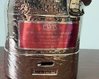 M10 - $20. Elvis Decanter (Empty) Music Box. Measures 8.5" x 5.5" x 15.25" tall.