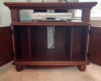 M13 - $30. TV / Media Stand in good condition. Measures 35.5" x 24.5" x 29.75" tall. Pressed wood. (We can't find anymore interior shelves for CD storage.)