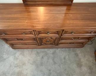 M30 - $85. Thomasville Dresser with Mirror. Measures 70" wide x 20" deep x 32" tall to the top of dresser. 80" to the top of the mirror. Mirror is 29.75" x 48.5" and comes off to move)