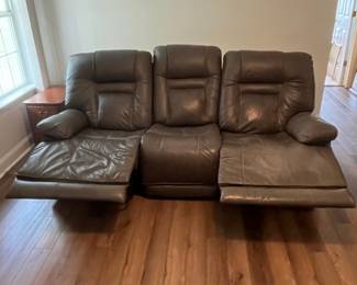 M2 - $450. Ashley Furniture Power Reclining Sofa. Measures 87.5" long x 36" deep x 42" tall. Gently used - cushion on the right shows the most wear.