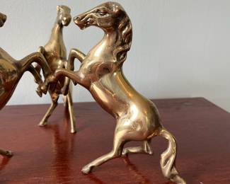 M16 - $50. Brass 3 Horse Pedestal Stand (holds a crystal sphere). Measures 10" wide x 6" tall.