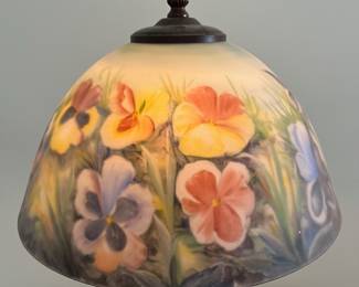 M35 - $40. Table Lamp with Painted Glass Shade. Tiffany Style with Pansy Design. Measures 18.5" tall.