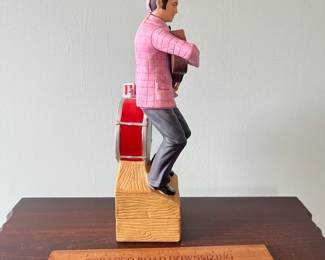 M7 - $20. Elvis Decanter Music Box.