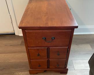 M37 - $30. Single Side Table. Measures 15" wide x 25" deep x 22" tall. One drawer. Bottom is a door. There is another storage area on the back that pulls open as well.