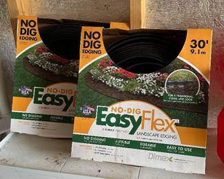M52 - $20 for 2 rolls! EasyFlex No Dig Garden Edging. 30' a roll.