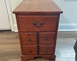 M37 - $30. Single Side Table. Measures 15" wide x 25" deep x 22" tall. One drawer. Bottom is a door. There is another storage area on the back that pulls open as well.