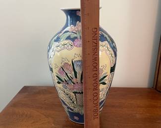 M32 - $10. Decorative Vase. Measures 7" across x 12" tall.