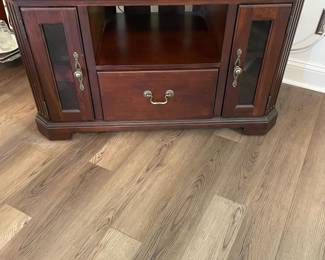 M3 - $35. TV / Media Cabinet. (Holding a 55" TV in this photo) Measures 43" wide x 25.5" deep x 25" tall.