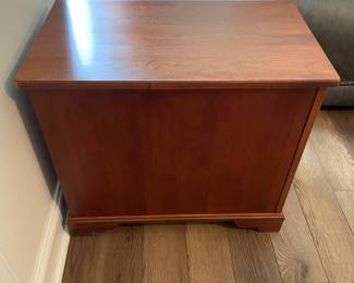 M37 - $30. Single Side Table. Measures 15" wide x 25" deep x 22" tall. One drawer. Bottom is a door. There is another storage area on the back that pulls open as well.
