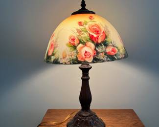 M36 - $40. Tiffany Style Table Lamp with painted rose glass shade. Measures 18.5" tall.