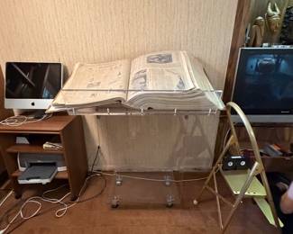 Custom made lucite book holder / podium on wheels made to display this book of The New York Times Newspapers from August 1923