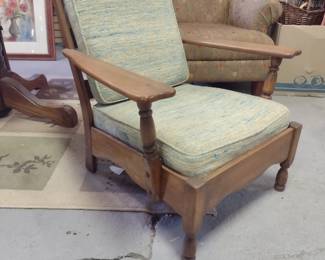 Mid century wooden chair with upholstered cushions 