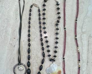 Assorted Necklaces: Purple Beaded, Mother-of-Pearl Pendant, Jet Beads, and Pendant Necklace