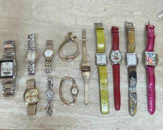 Assorted Ladies' and Men's Wristwatches including Raymond Weil, Skagen, and Elgin