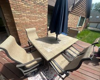 Patio set 4 chairs and umbrella $ 150.00