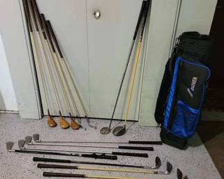 Golf Clubs and a Datrek golf bag,