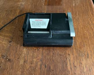 Electric cigarette rolling machine.