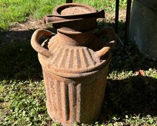 Antique milk can.