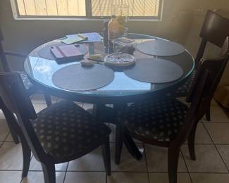 Table with glass top 6 chairs very heavy
