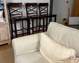 3 dark wood bar chairs in great condition; arm chair and luxury pillow