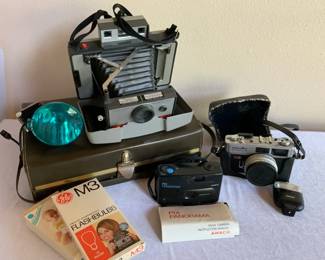 Minolta Himatic E, Ansco Pix Panorama,  Polaroid 220 Cameras