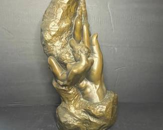 Sculpture inspired by Auguste Rodin’s "The Hand of God"