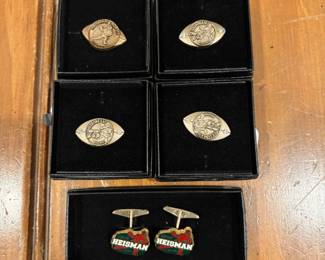 Heisman memorial trophy pins and cuff links