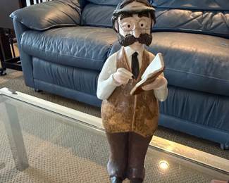 Figurine of a Man Reading a Book