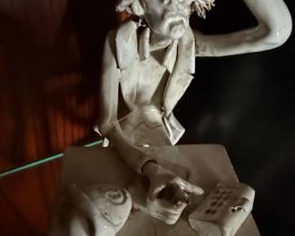 Humorous Figurine of a Man at a Desk second image