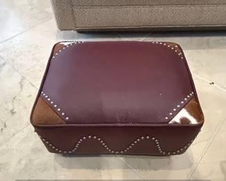 Faux Leather and Cowhide Upholstered Ottoman with Nailhead Trim