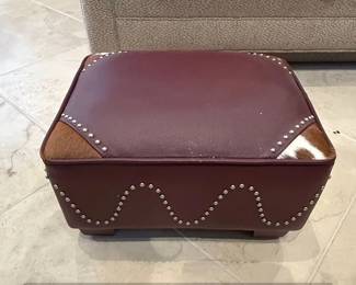 Faux Leather and Cowhide Upholstered Ottoman with Nailhead Trim second image