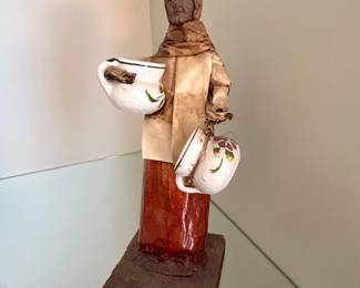 Folk Art Figurine of a Woman with Cups